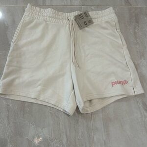 Puma Soft White Shorts with Pink Logo